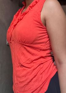 Coral Ruffle Neck Sleeveless Top