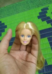 (do no byu )rerooted doll head rererved for Allen.