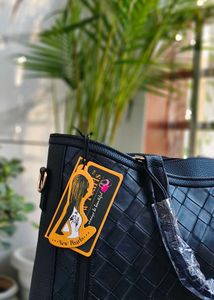 Elegant Black Woven Handbag