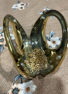 Unique Gold Sphere, red and blue clutch