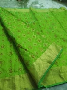 Vibrant Green Saree with Golden Border