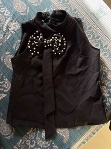 Chic Black Sleeveless Pearl Embellished Top