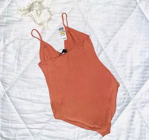 Coral Ribbed Bodysuit