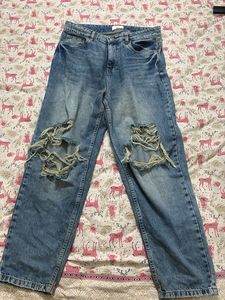 Distressed Blue Denim Jeans