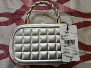 Silver Quilted Box Clutch with Twisted Handle