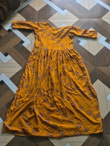 Elegant Yellow Kurta with Intricate Embellishments