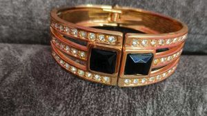 Elegant Rose Gold Bangle with Black Stones