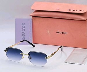 Miu Mi Rimless Octagonal Sunglasses
