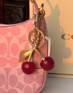 Coach Pink Signature Cherry Charm Shoulder Bag🍒