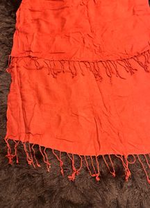 Vibrant red scarf with Tassels