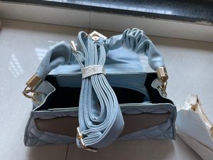 Handbag Or Slingbag