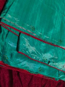 Beautiful Teal Saree with Red Border