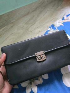 Sleek Black Clutch with Metal Clasp