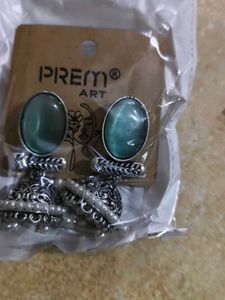 Elegant Jhumka Earrings with Green Stone