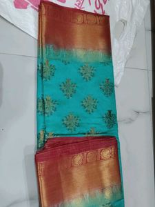 Beautiful Teal Saree with Gold Border
