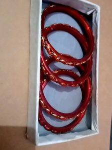 Set of Red Bangles with Gold Detail