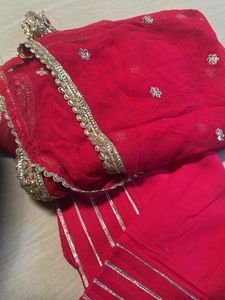 Vibrant pink suit with Silver Border