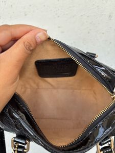 Coach Black Signature mini rowan (without charms)
