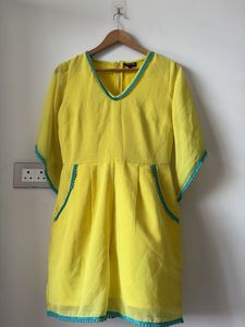 Vibrant Yellow jumpsuit with Teal Trim