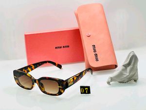 MIU MI Tortoiseshell Sunglasse