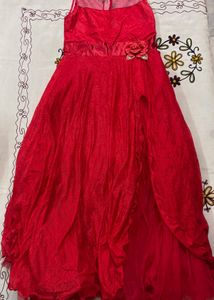 Red lace gown with slit and embellished neckline