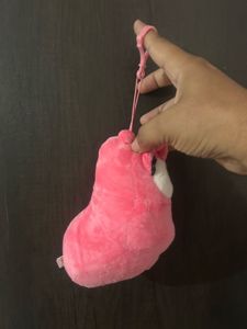pink Larva character plush keychain featuring
