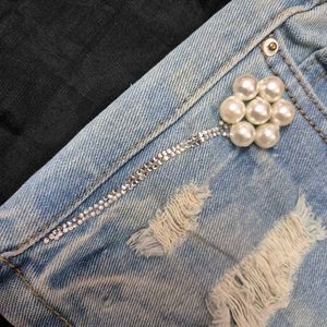 low waist Distressed Denim Shorts with Pearls