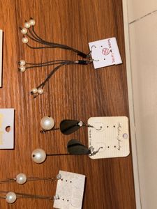 Pairs of 8 Earrings  (6 long, 2 small)