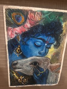 A krishna ji painting with cow