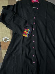 Curved hemline-black kurta with woven embroidery