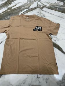 last price Nike Tan Graphic Tee