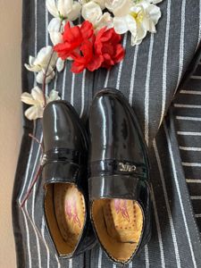 Black Patent Loafers unused. Fits from 6 mont