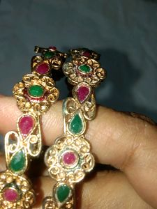 Gold Matte Finish Green And Red Stones Studded Flower Designed Metal Bangles