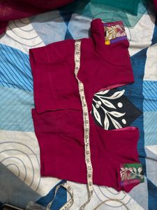 Vibrant magenta and green Floral Embroidered Saree