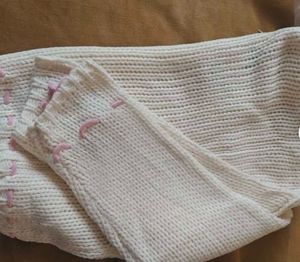 Cozy Cream Knit Sweater with Pink Accents