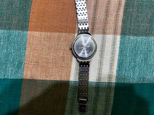 Elegant Silver Tone Watch with Rhinestone Accents