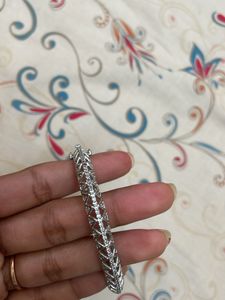 Elegant Silver Bangle with Crystals