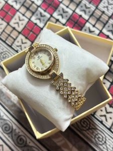 Elegant Gold Watch with Rhinestones