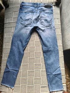 Light Blue Distressed Denim Jeans