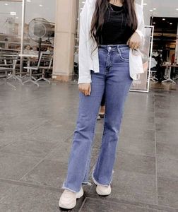 Flared Blue Denim Jeans and one distressed jean