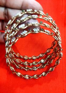 Vintage Gold Tone Floral Bangles - Set of 4