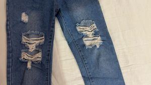 Distressed Blue Denim Jeans