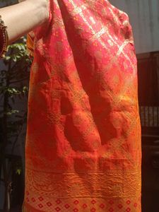 Vibrant Orange Paisley Embellished Saree stone wor