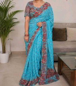 Beautiful Blue Embroidered Saree coin available
