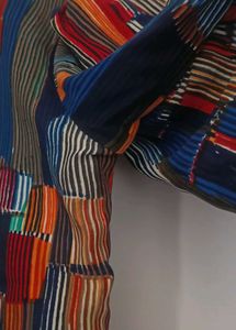 Vibrant Striped Blouse with Tassel Trim