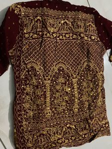 Exquisite Maroon &amp; Gold Embellished Lehenga Choli