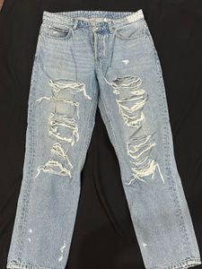Distressed Blue Denim Jeans