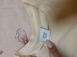 Top with attached denim slig bag