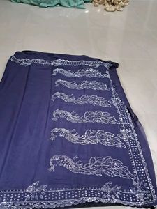 Elegant Dark Blue Saree with Silver Embellishments