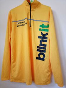 long-sleeved quarter-zip jersey for Blinkit.